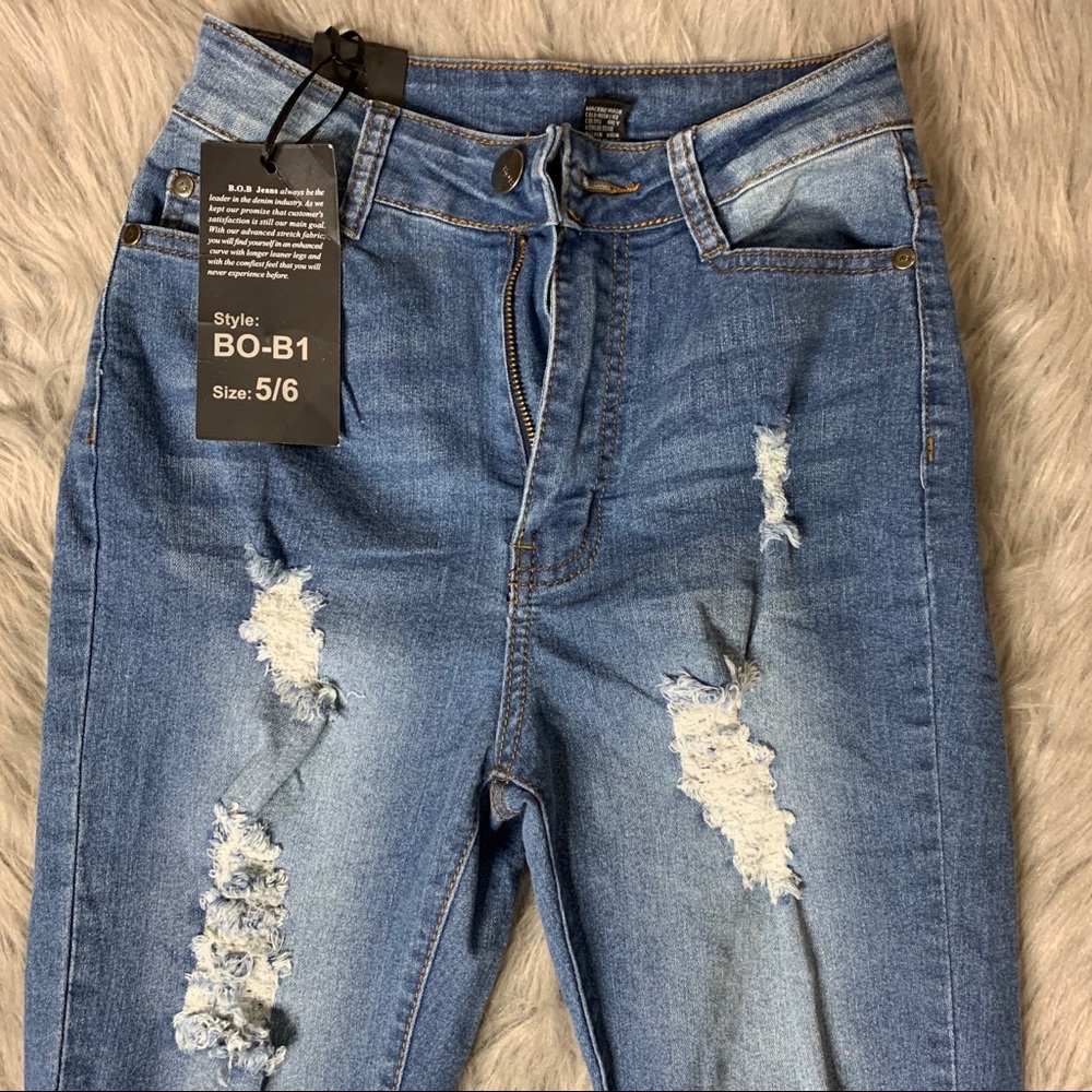 Distressed Blue Denim Jeans